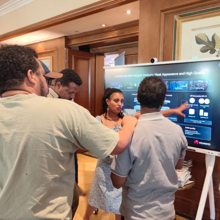 Huawei and BESYS Technologies team demonstrating smart classroom technology.